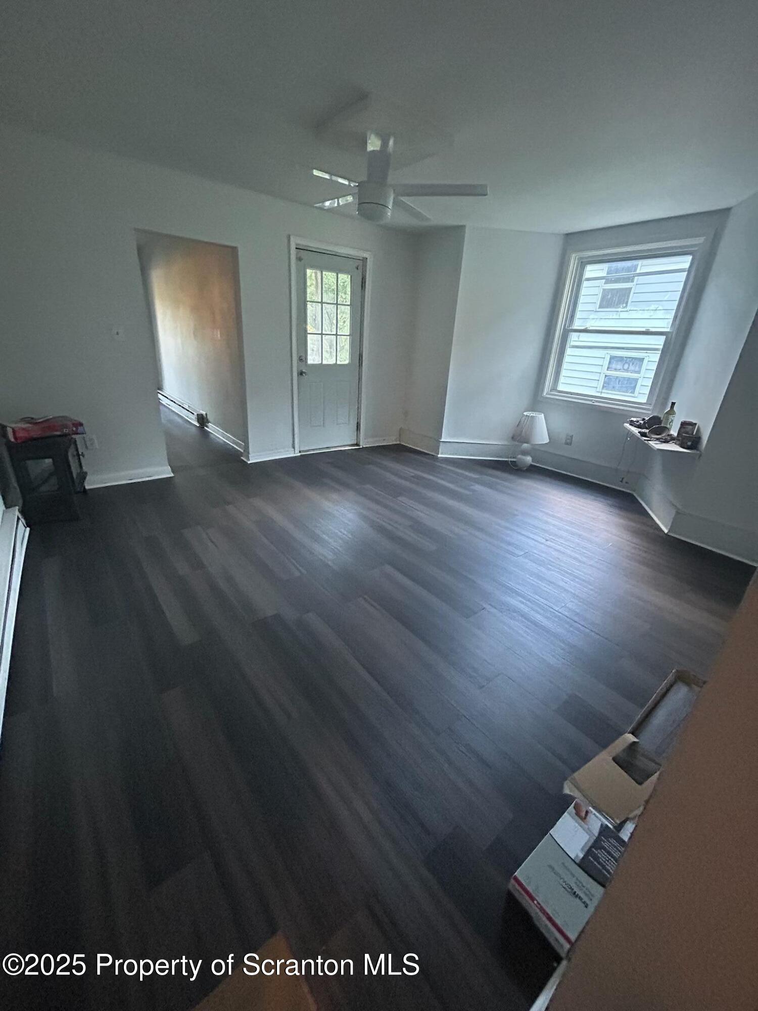 1177 North Main Street Forest City, PA 18421 - Photo 27 of 27 wooden floor in an empty room with a window
