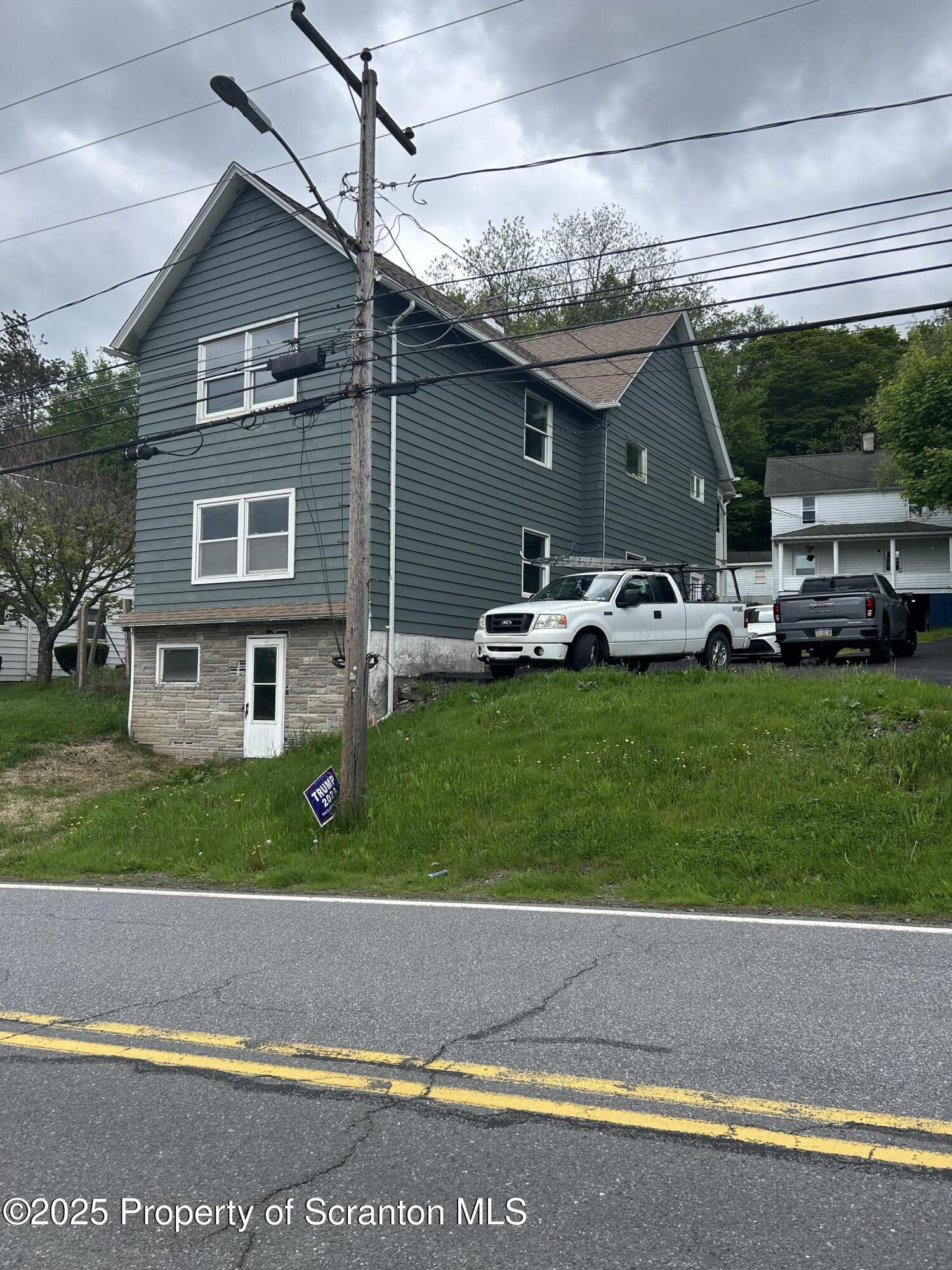 1177 North Main Street Forest City, PA 18421 - Photo 3 of 27 a view of a house with a yard and sitting area