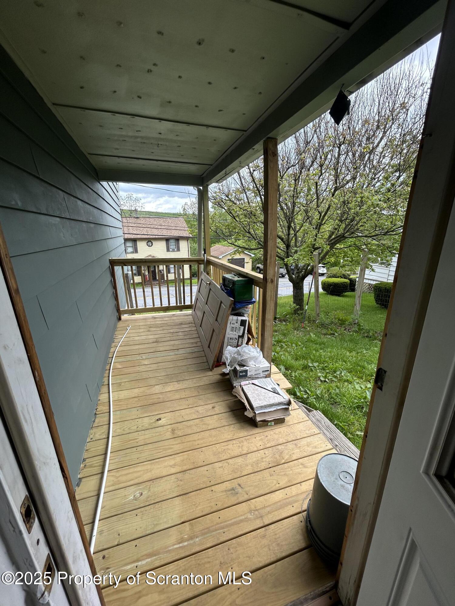 1177 North Main Street Forest City, PA 18421 - Photo 9 of 27 a view of a porch with furniture