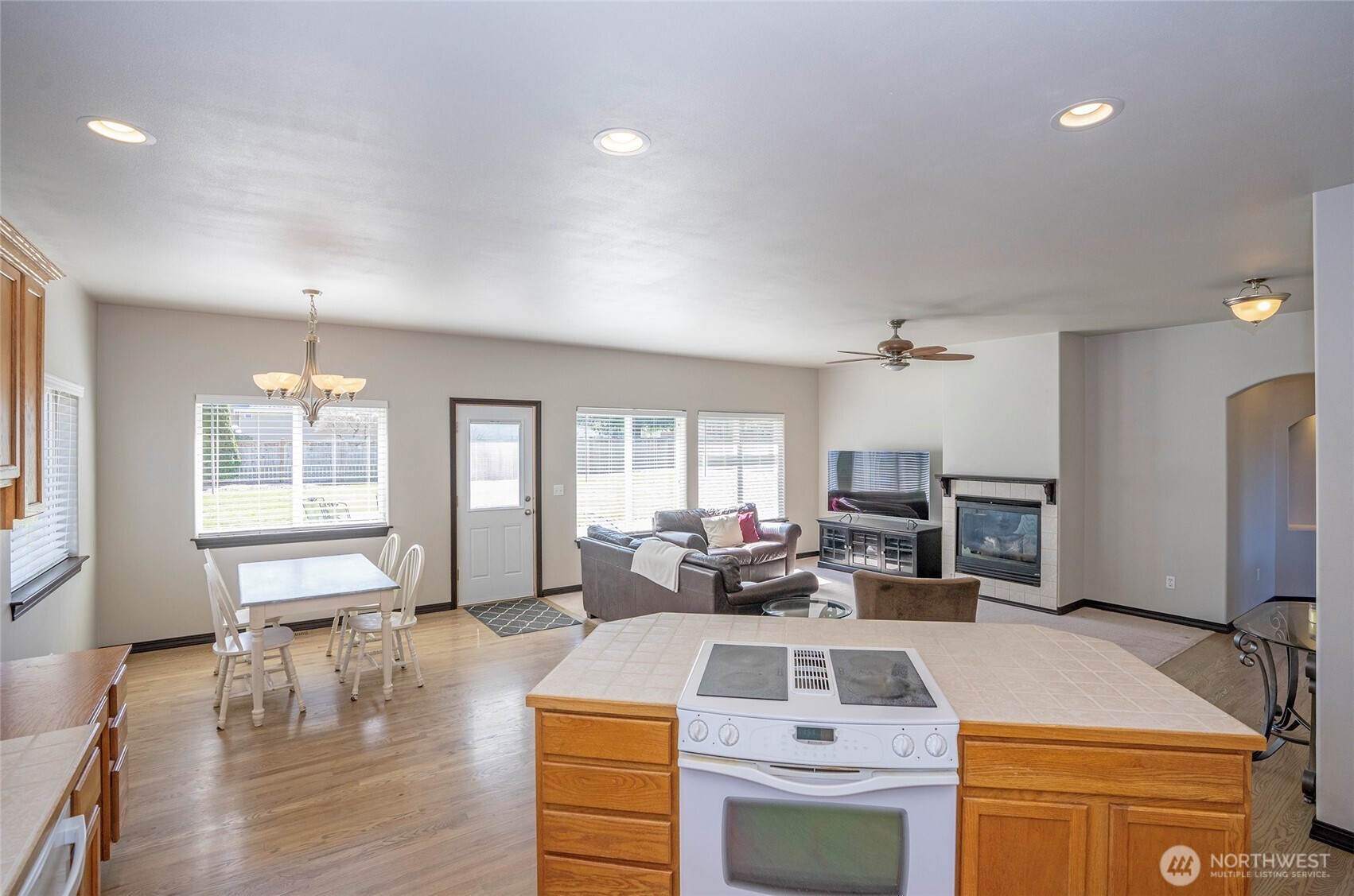 2229 Shay Court Buckley, WA 98321 - Photo 13 of 33 a living room with furniture a dining table and kitchen view