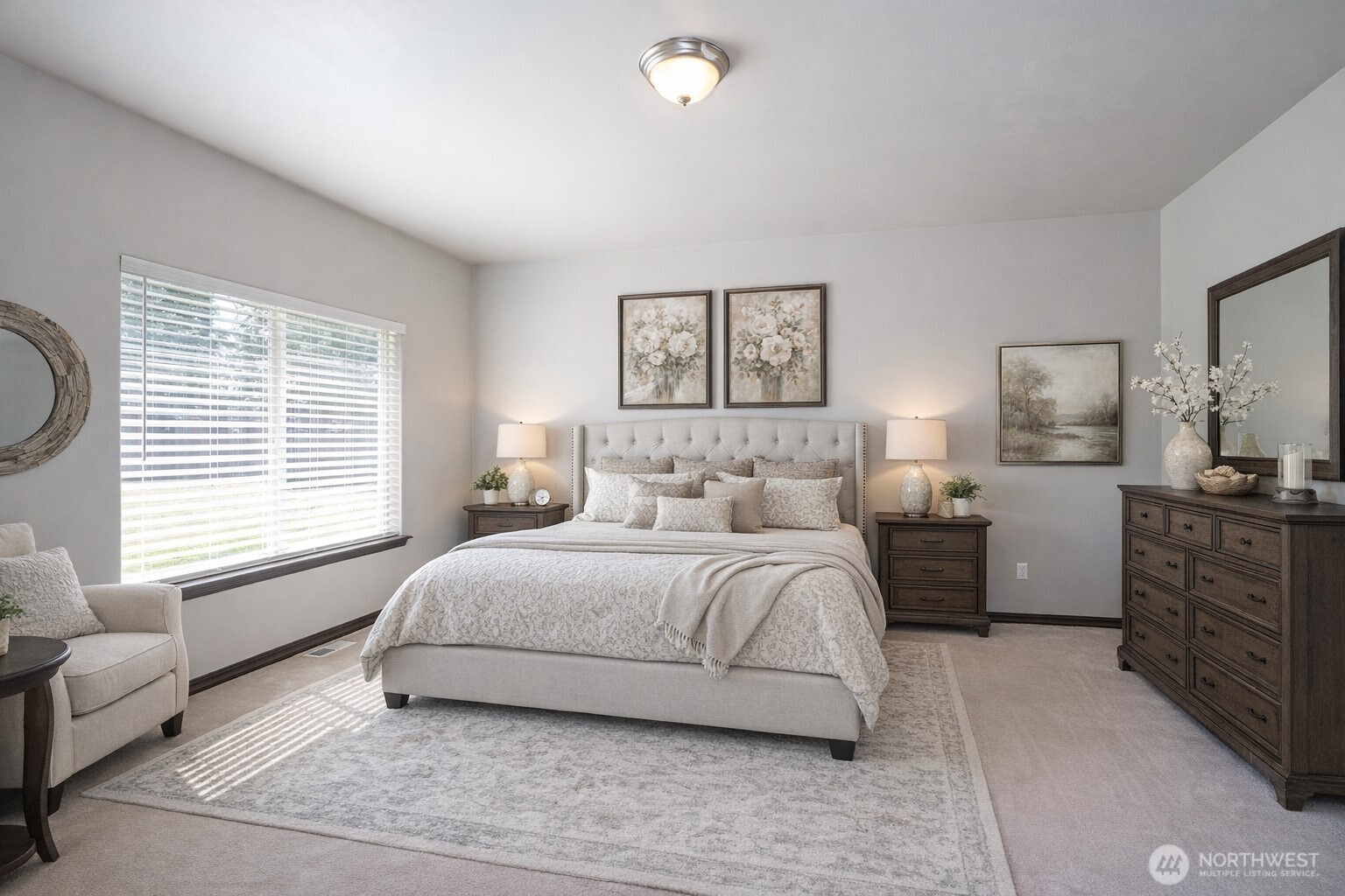 2229 Shay Court Buckley, WA 98321 - Photo 15 of 33 a spacious bedroom with a bed a couch and dresser