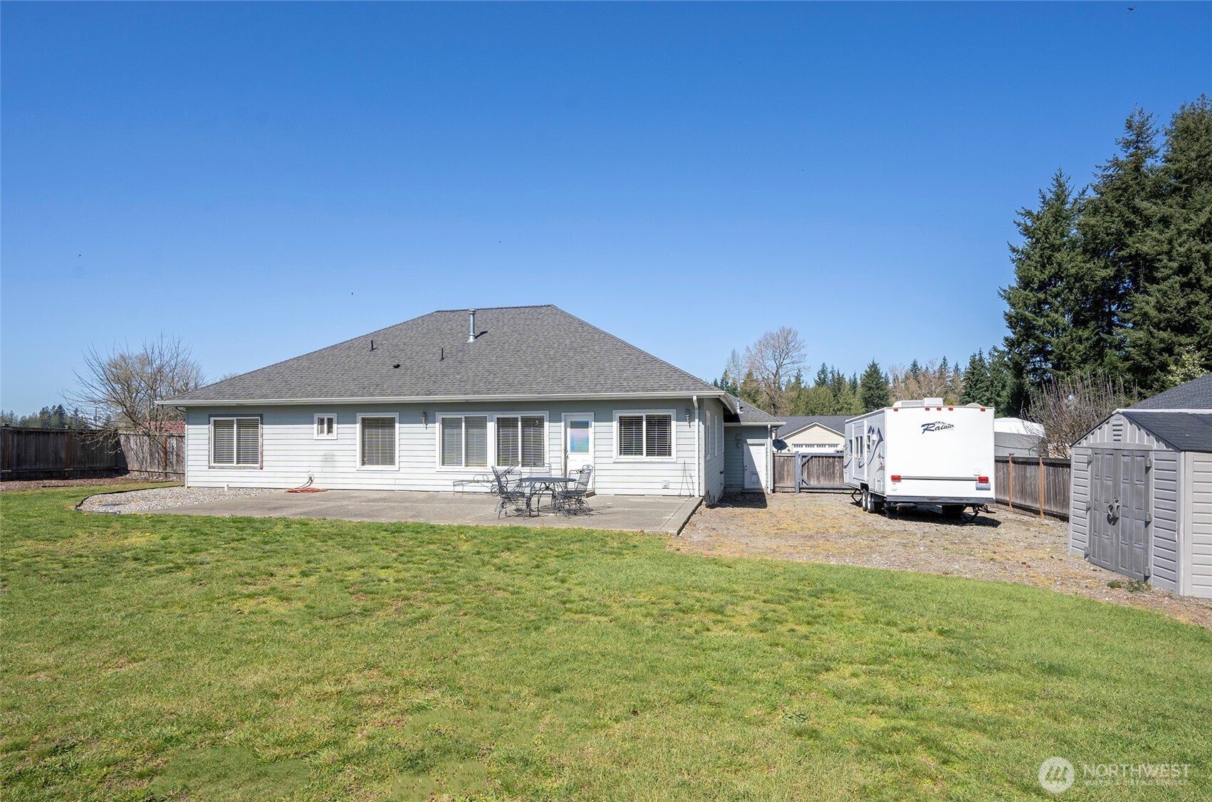 2229 Shay Court Buckley, WA 98321 - Photo 30 of 33 a front view of a house with a garden and yard