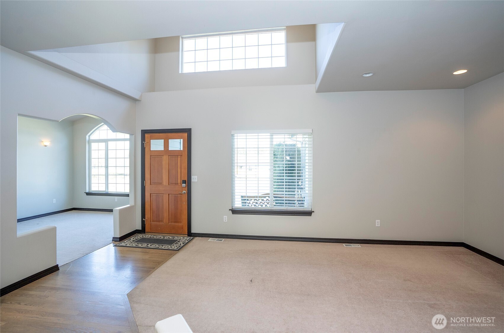 2229 Shay Court Buckley, WA 98321 - Photo 3 of 33 an empty room with wooden floor and windows