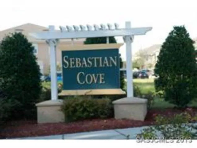 a sign that is on the side of the building