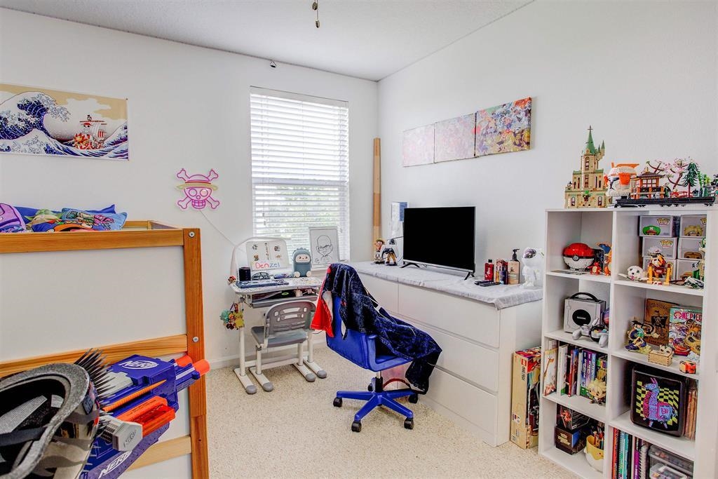 2344 Golden Lake Loop St. Augustine, FL 32084 - Photo 22 of 35 a view of a workspace with furniture and a window