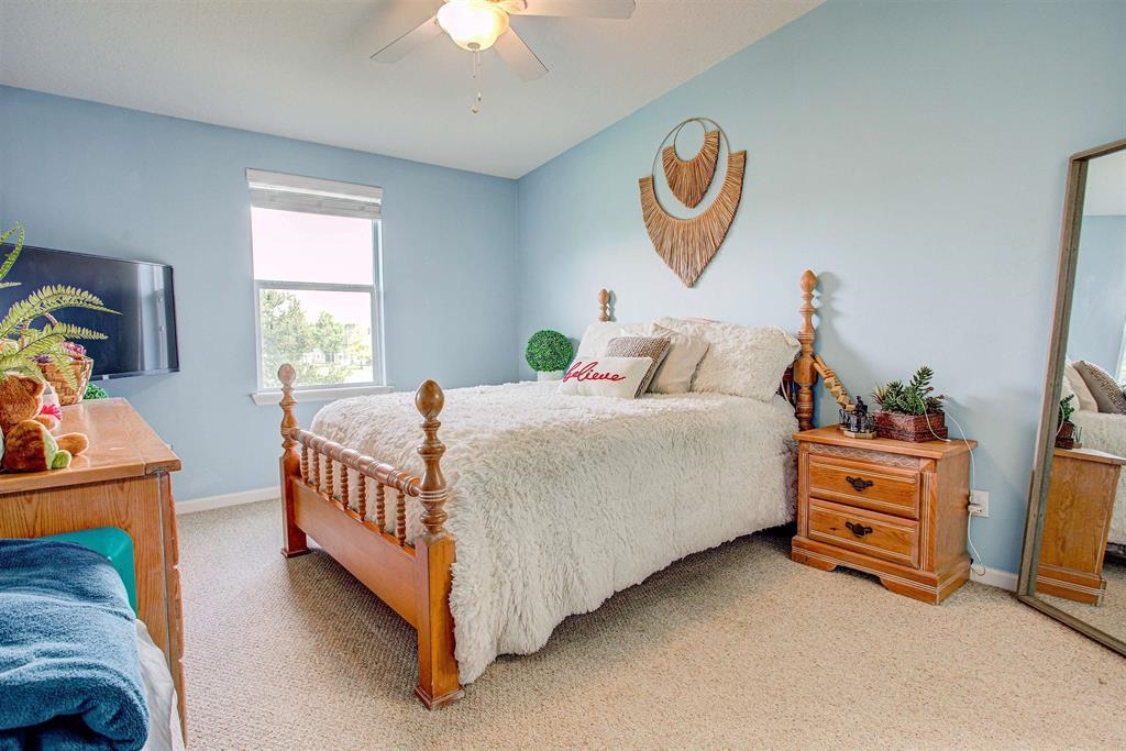 2344 Golden Lake Loop St. Augustine, FL 32084 - Photo 27 of 35 a bed room with a bed and a window