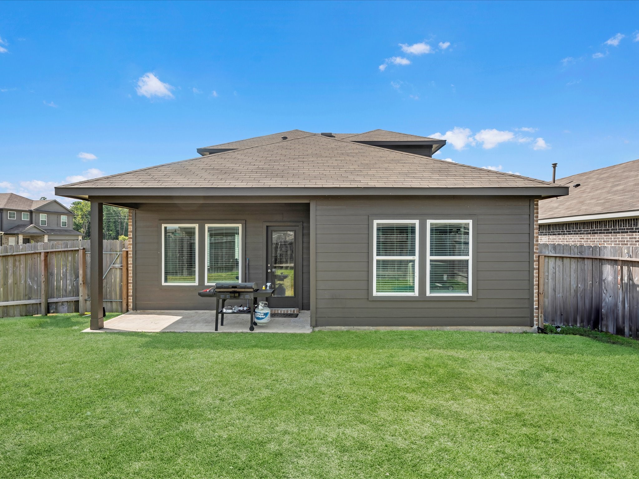 5455 Pinetree Crescent Ln Spring Spring, TX 77373 - Photo 23 of 25 Oversized back yard featuring a covered patio, and endless space.