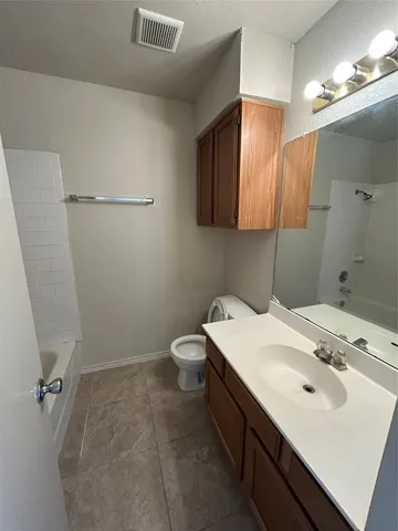 an empty room with windows and windows