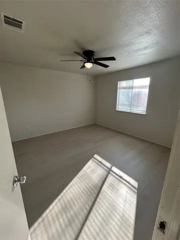 a view of a livingroom with a staircase