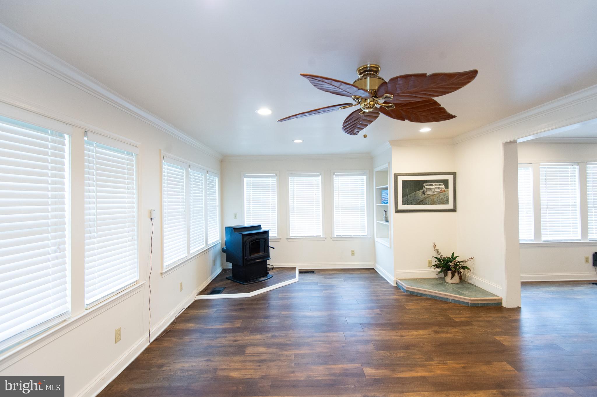 2407 Hoopers Island Road Fishing Creek, MD 21634 - Photo 19 of 69 Living Room with pellet stove