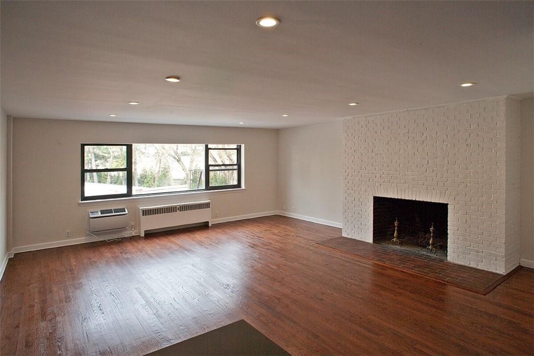 16 Studio Arcade, Unit 2C Bronxville, NY 10708 - Photo 1 of 1 Expansive Main room with larege windows and fireplace