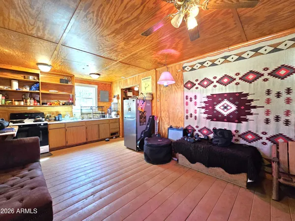 a view of kitchen with wooden floor