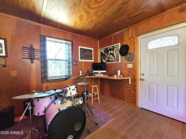 a view of a livingroom with furniture and window