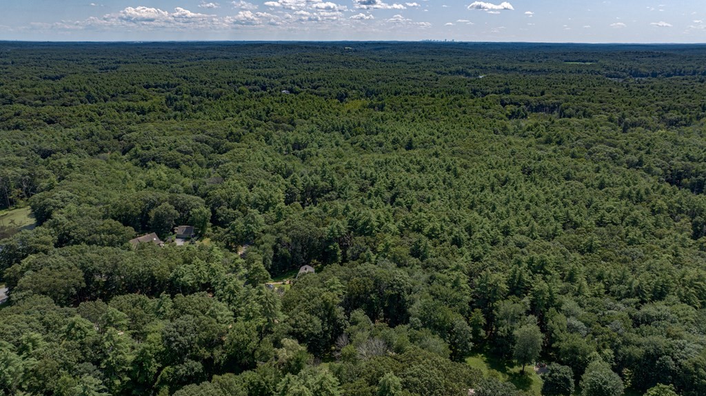 255 Newbury Road Rowley, MA 01969 - Photo 3 of 16 an aerial view of residential houses with outdoor space and trees