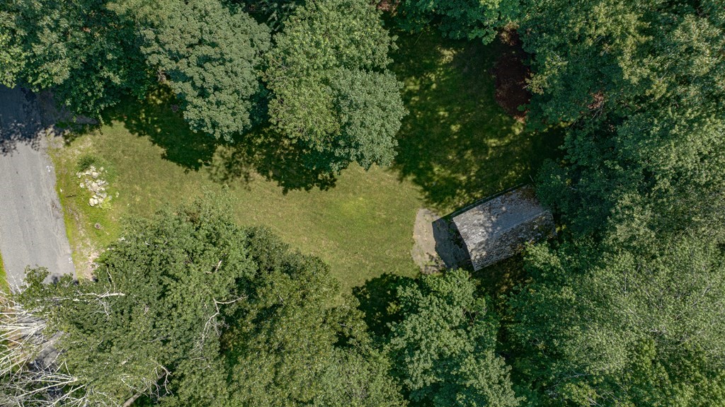 255 Newbury Road Rowley, MA 01969 - Photo 8 of 16 an aerial view of a house with a yard
