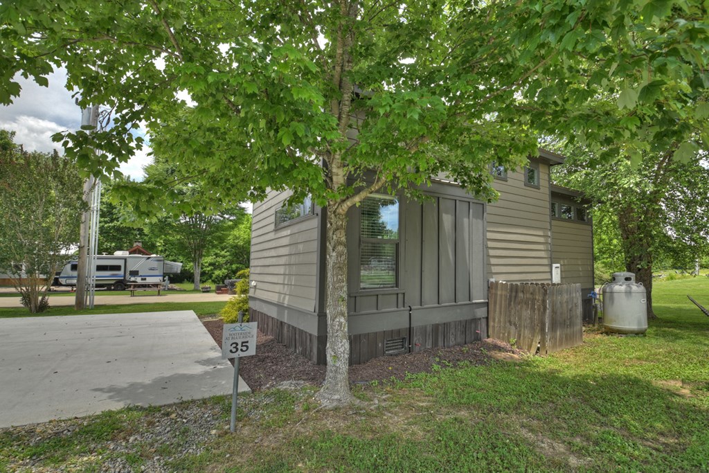35 Mountain Meadows Circle Morganton, GA 30560 - Photo 14 of 41 a view of a backyard with slide