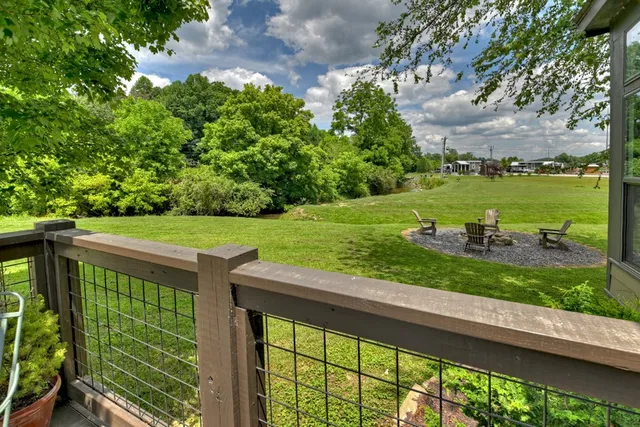 a view of a balcony with an outdoor space