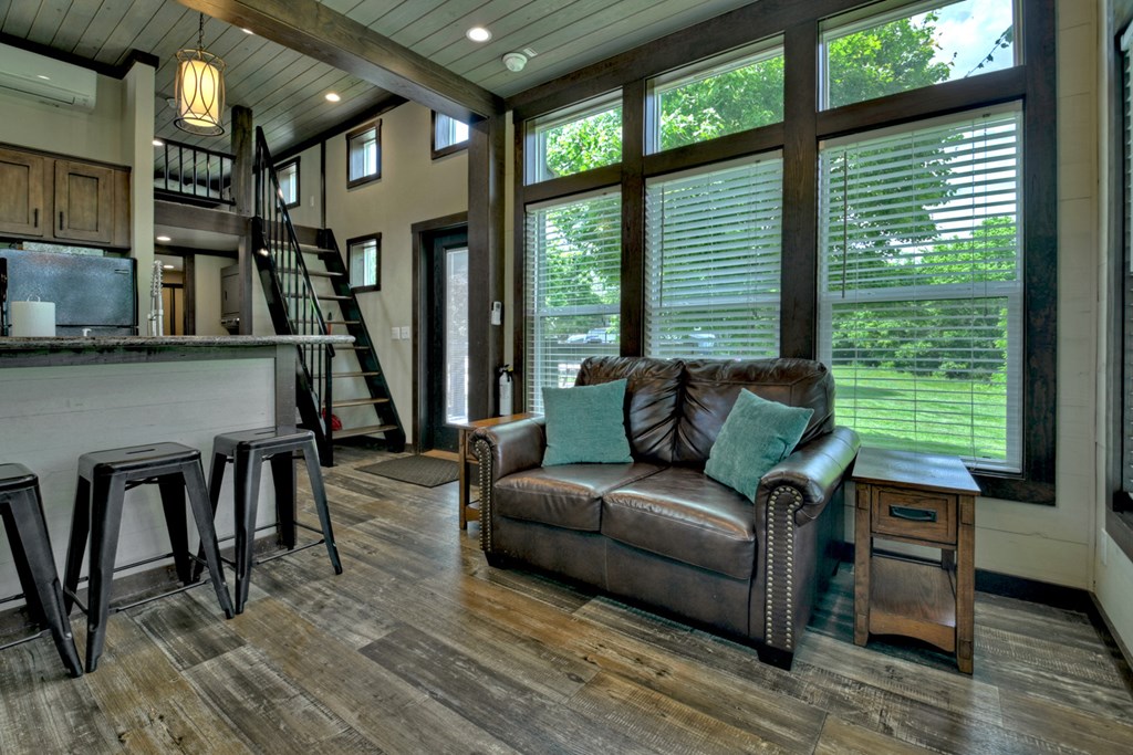 35 Mountain Meadows Circle Morganton, GA 30560 - Photo 21 of 41 a living room with furniture a large window and wooden floor