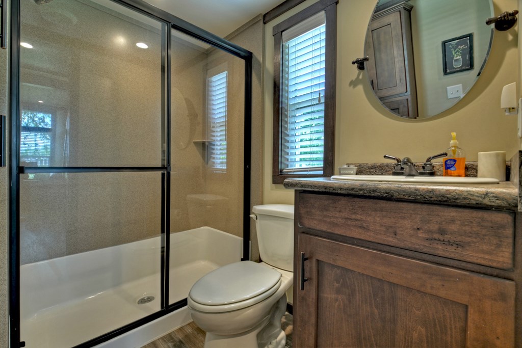 35 Mountain Meadows Circle Morganton, GA 30560 - Photo 29 of 41 a bathroom with a sink toilet and shower