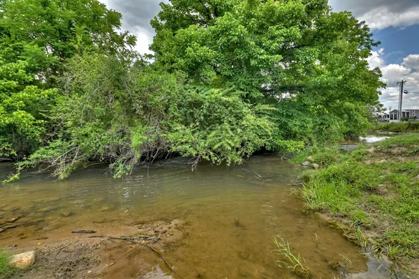 a view of a lake with a house