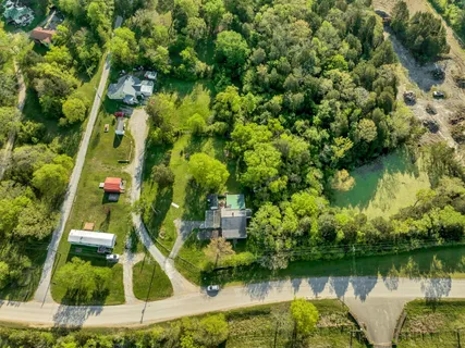 a view of a lake with a house in the background