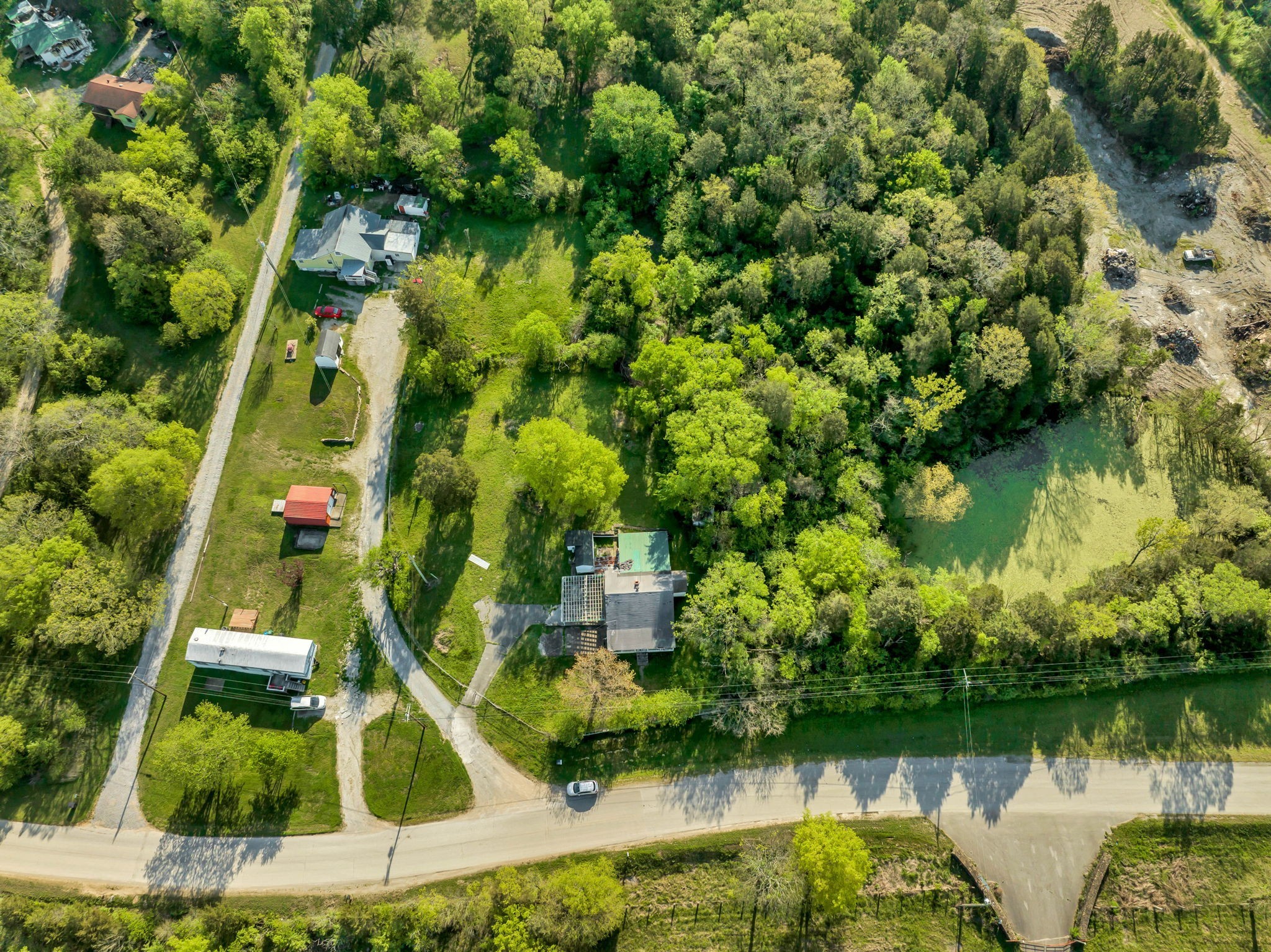 1810 Monsanto Road Columbia, TN 38401 - Photo 1 of 10 a view of a lake with a house in the background