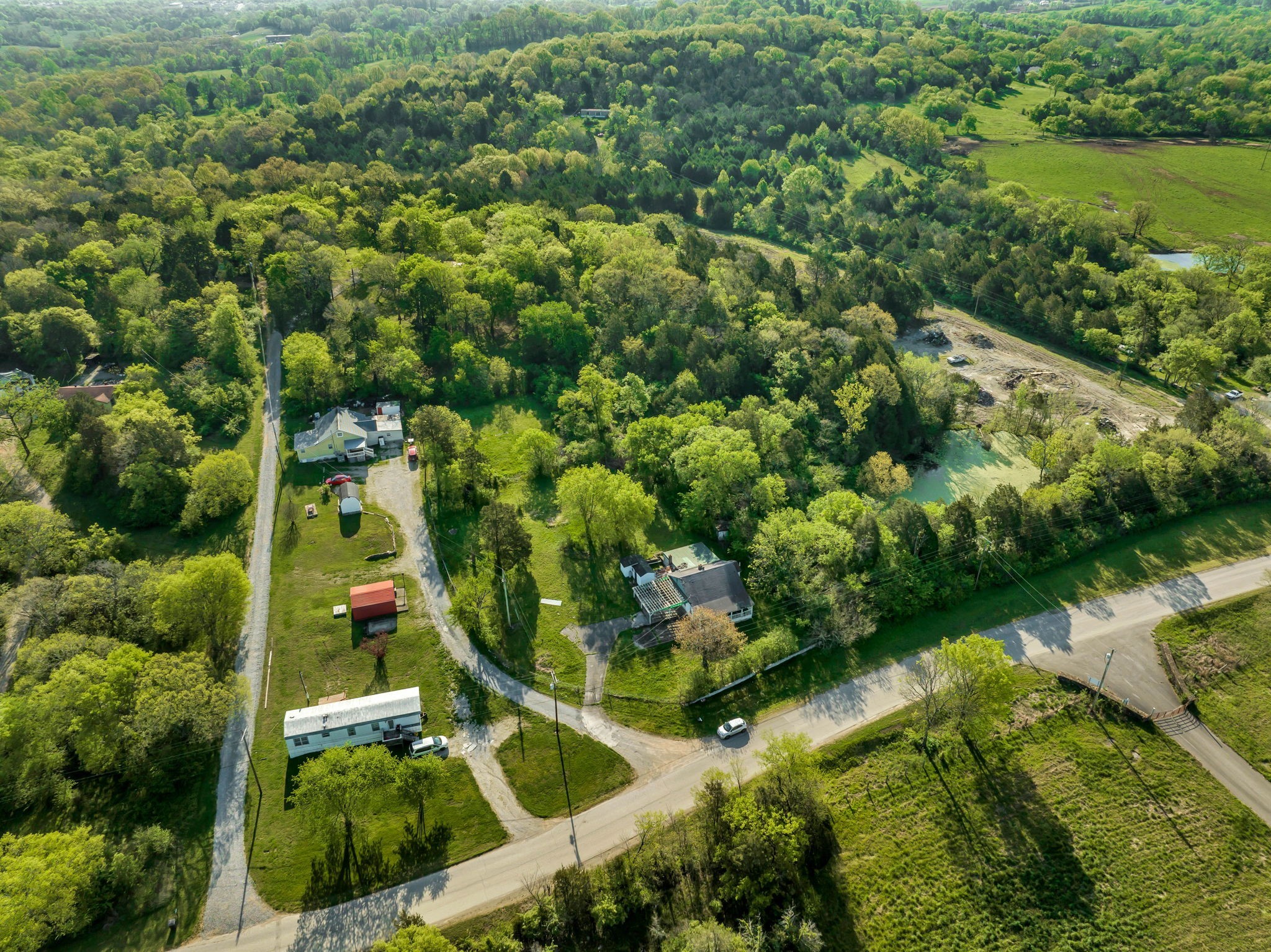 1810 Monsanto Road Columbia, TN 38401 - Photo 2 of 10 an aerial view of residential houses with outdoor space and trees