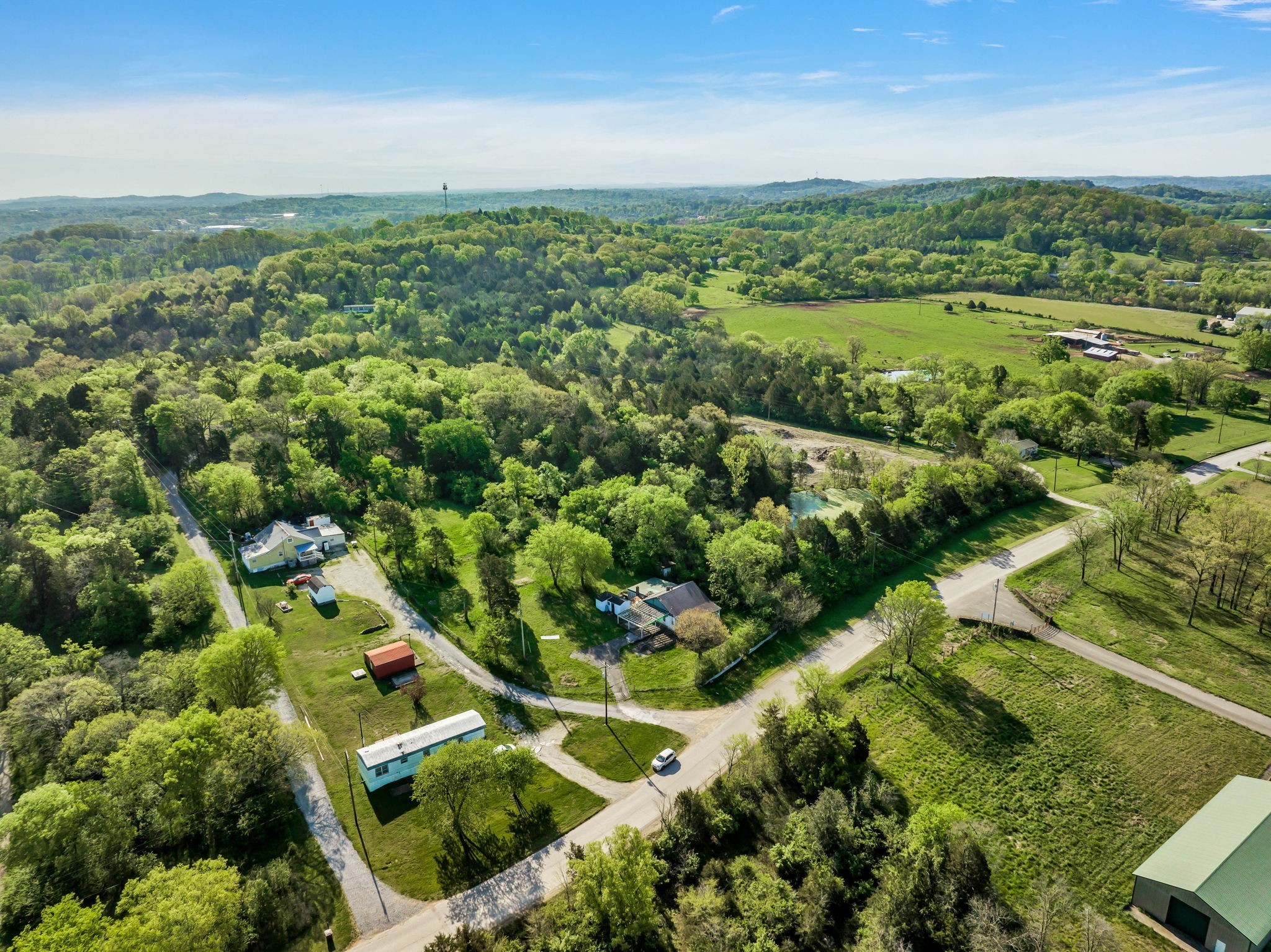 1810 Monsanto Road Columbia, TN 38401 - Photo 9 of 10 an aerial view of residential houses with outdoor space and trees