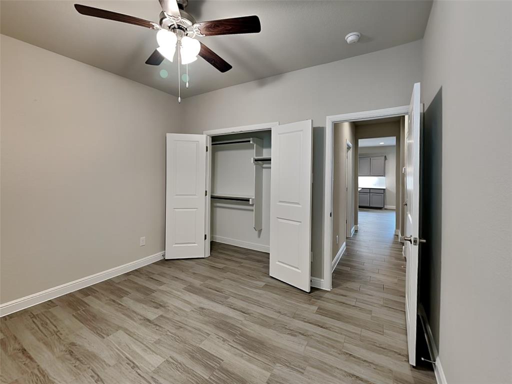 2344 Jack Rabbit Way Northlake, TX 76247 - Photo 13 of 17 a view of empty room with wooden floor