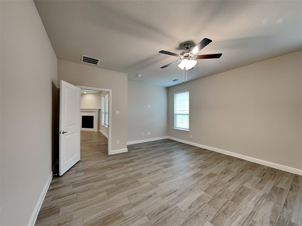 2344 Jack Rabbit Way Northlake, TX 76247 - Photo 7 of 17 a view of an empty room with a window