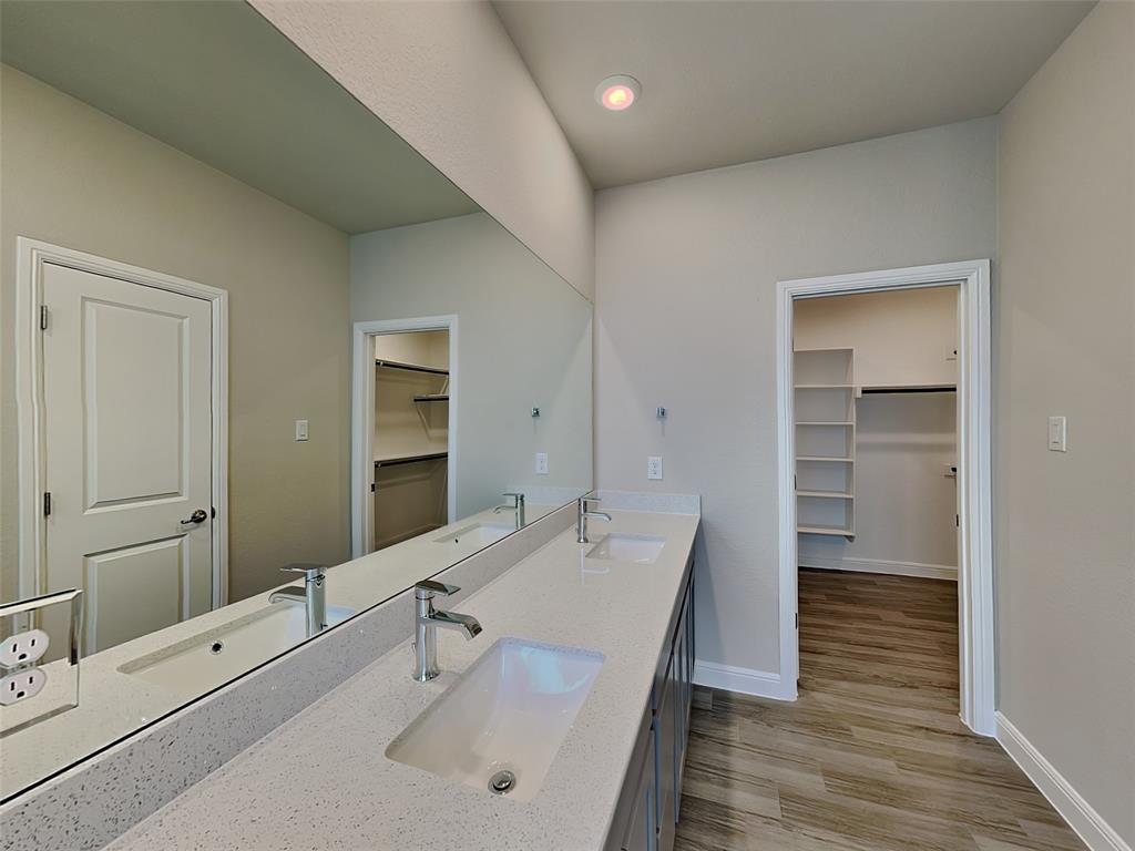 2344 Jack Rabbit Way Northlake, TX 76247 - Photo 9 of 17 a bathroom with a sink and a mirror