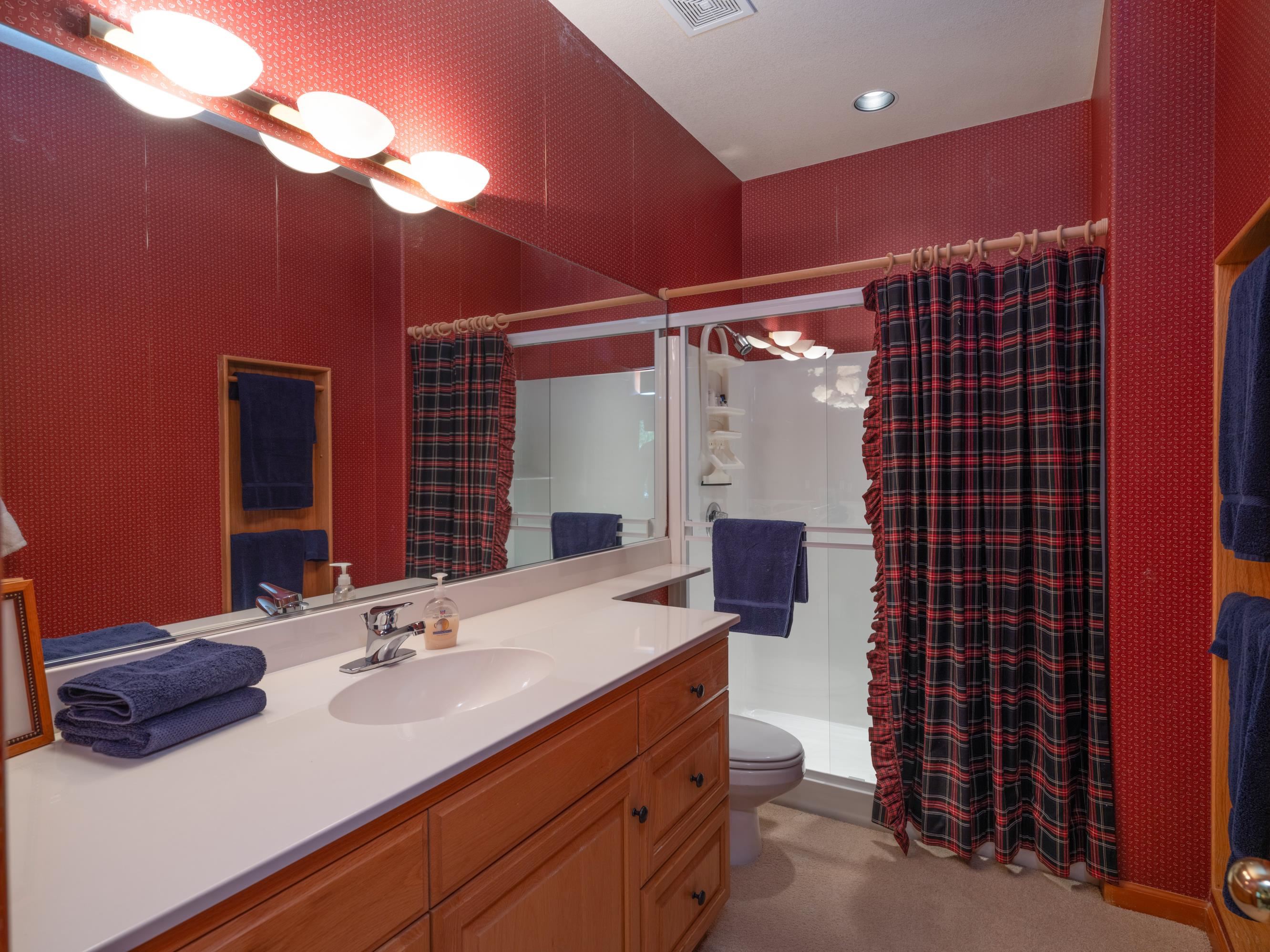 134 Quail View Circle Clio, CA 96106 - Photo 22 of 49 a bathroom with a sink double vanity and a shower