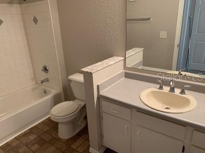 824 Camargo Way, Unit 206 Altamonte Springs, FL 32714 - Photo 7 of 10 a bathroom with a sink toilet and shower