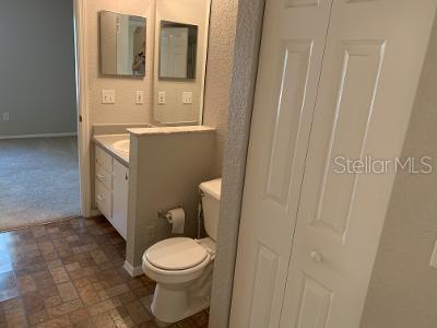 824 Camargo Way, Unit 206 Altamonte Springs, FL 32714 - Photo 10 of 10 a white toilet sitting next to a bathroom sink