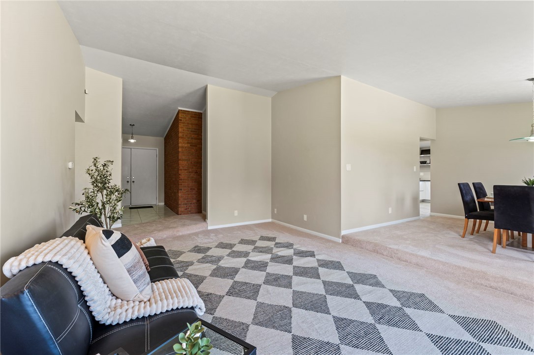 2247 East Whipp Road Dayton, OH 45440 - Photo 10 of 52 This inviting space features a seamless transition between living and dining areas, perfect for daily life.