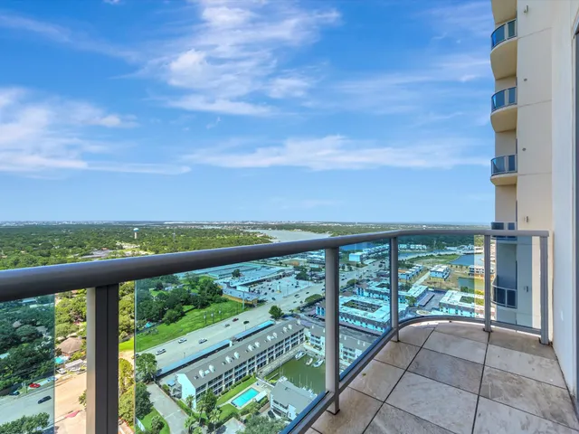 a view of balcony with yard
