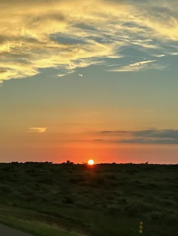 a view of a lake with tall buildings