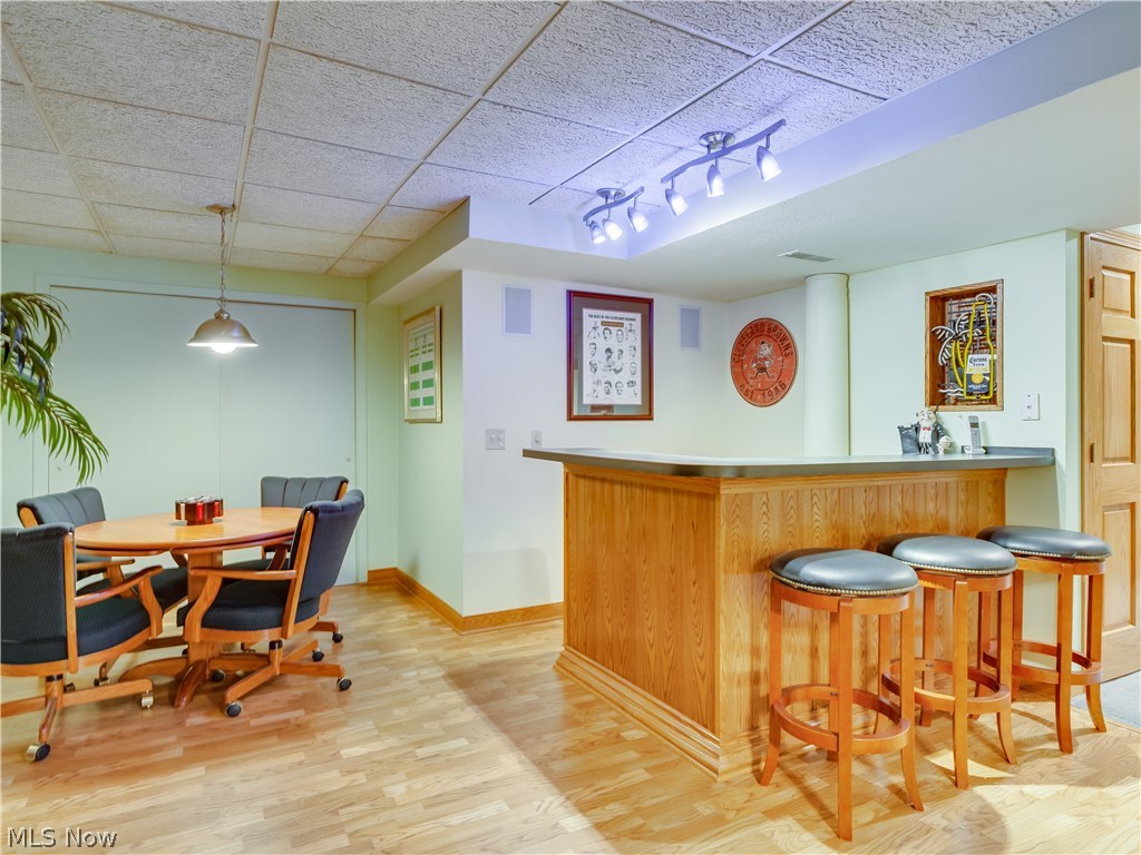 876 Hunter Ridge Circle Fairlawn, OH 44333 - Photo 26 of 35 Great bar with fridge, sink and even room for a game of cards.