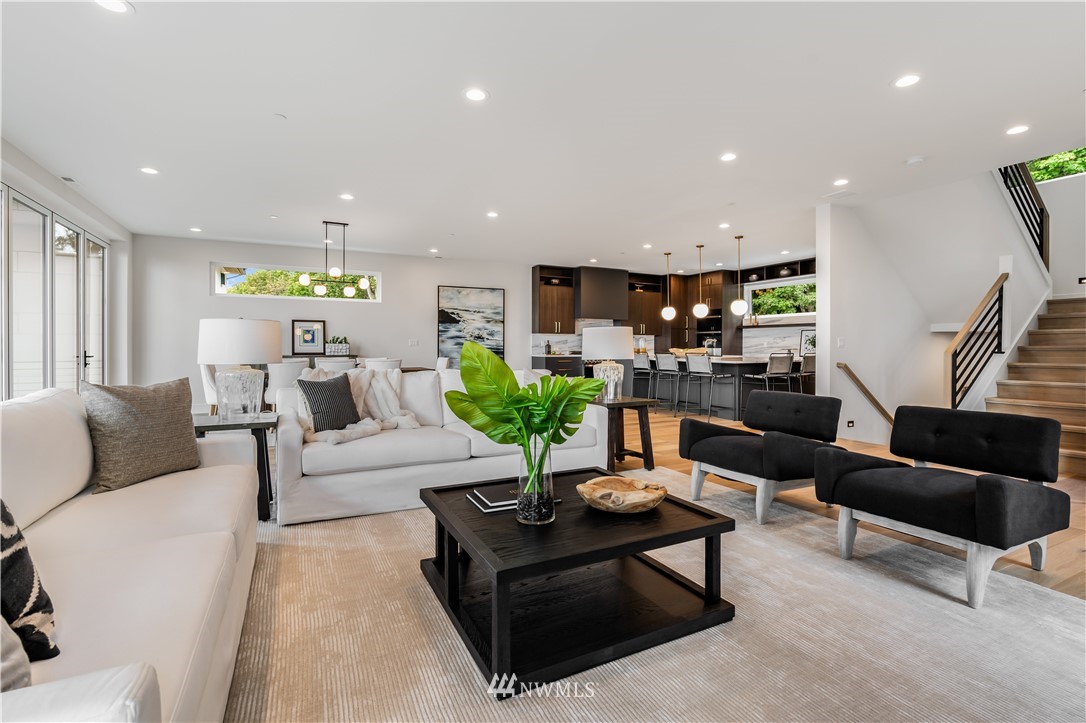 5616 Beach Drive Southwest Seattle, WA 98136 - Photo 3 of 40 a living room with furniture and a potted plant