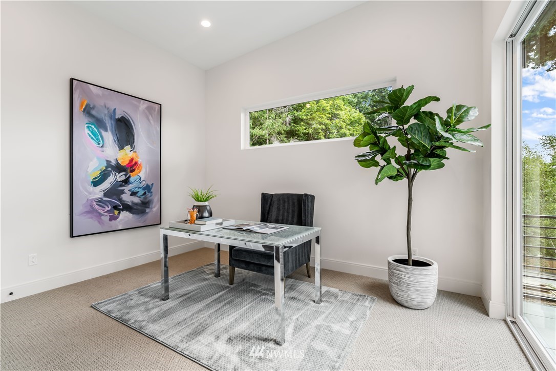 5616 Beach Drive Southwest Seattle, WA 98136 - Photo 22 of 40 a living room with furniture and a potted plant