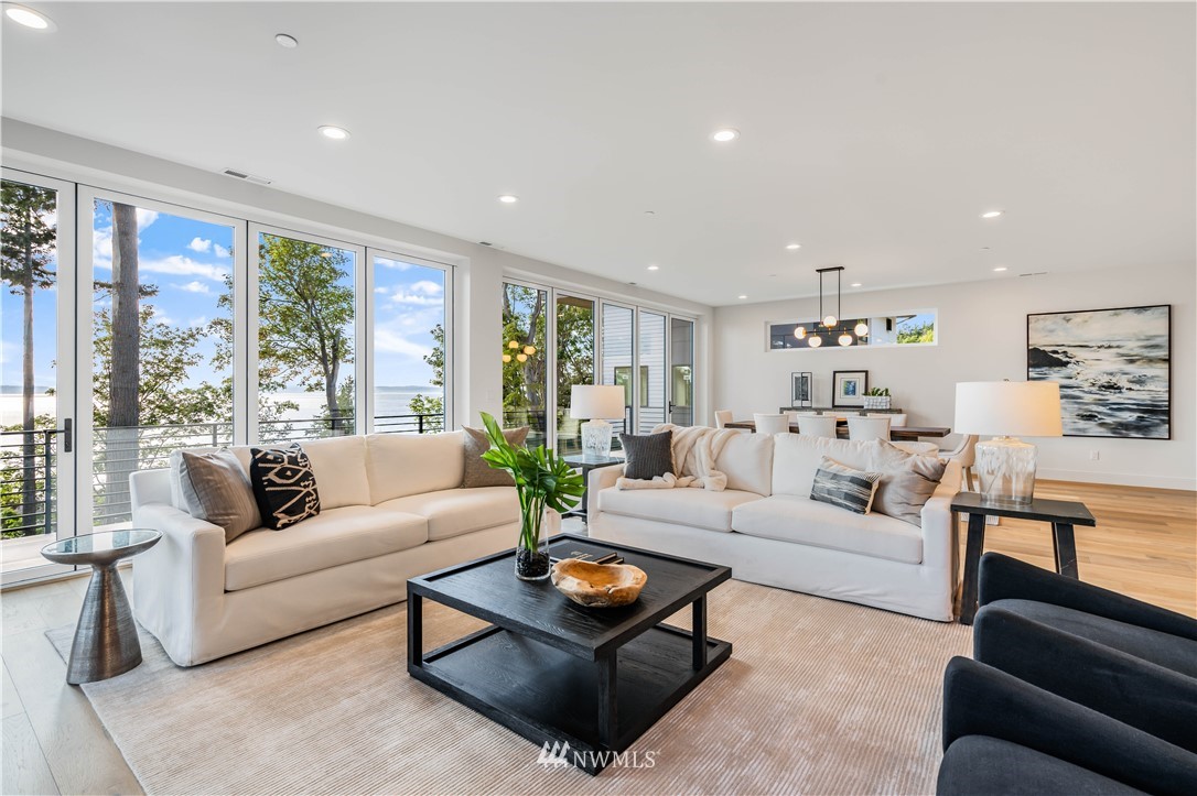 5616 Beach Drive Southwest Seattle, WA 98136 - Photo 4 of 40 a living room with furniture and a large window