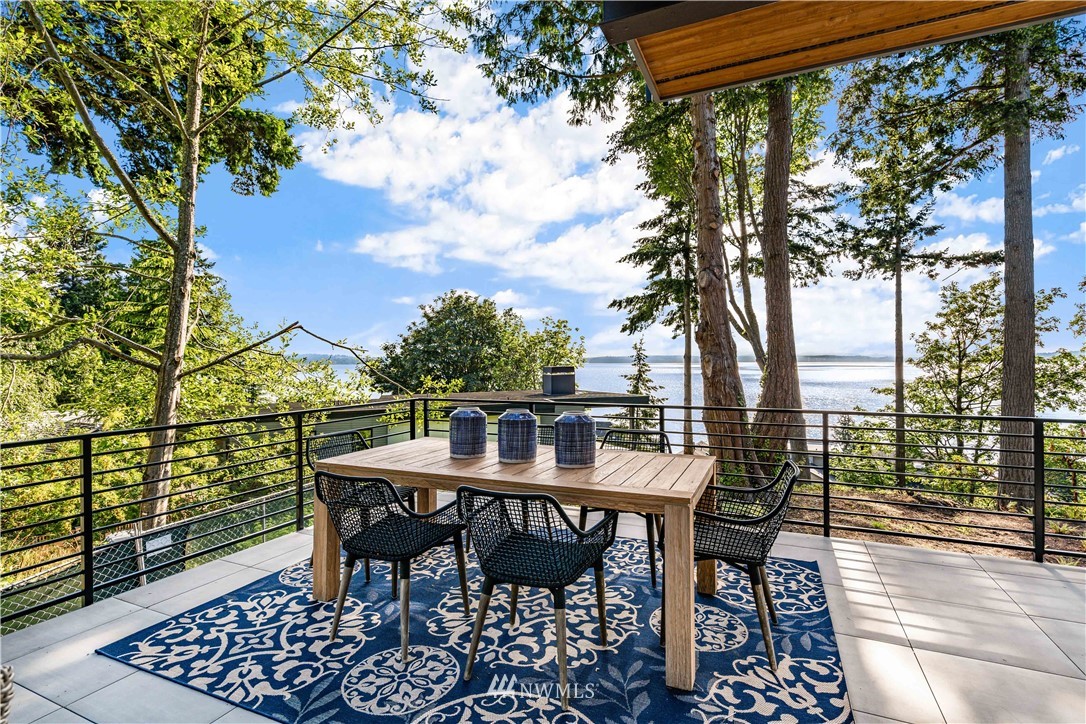 5616 Beach Drive Southwest Seattle, WA 98136 - Photo 31 of 40 a view of a chairs and table in the patio