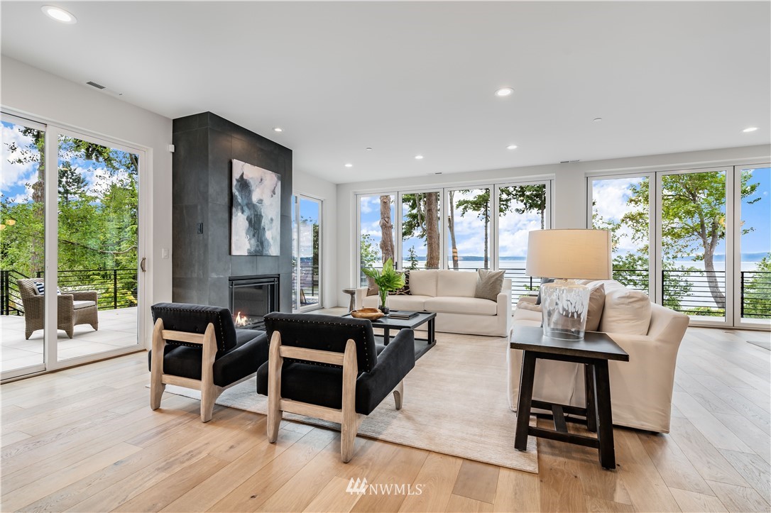 5616 Beach Drive Southwest Seattle, WA 98136 - Photo 5 of 40 a living room with furniture and a wooden floor