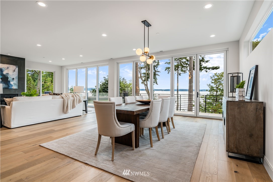 5616 Beach Drive Southwest Seattle, WA 98136 - Photo 6 of 40 a view of a dining room with furniture window and outside view