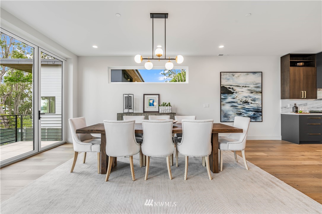 5616 Beach Drive Southwest Seattle, WA 98136 - Photo 8 of 40 a view of a dining room with furniture window and outside view