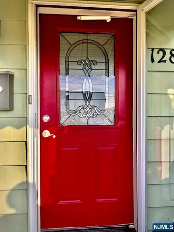 a close view of door with a hallway