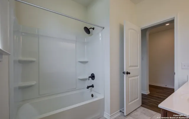 a bathroom with a bathtub