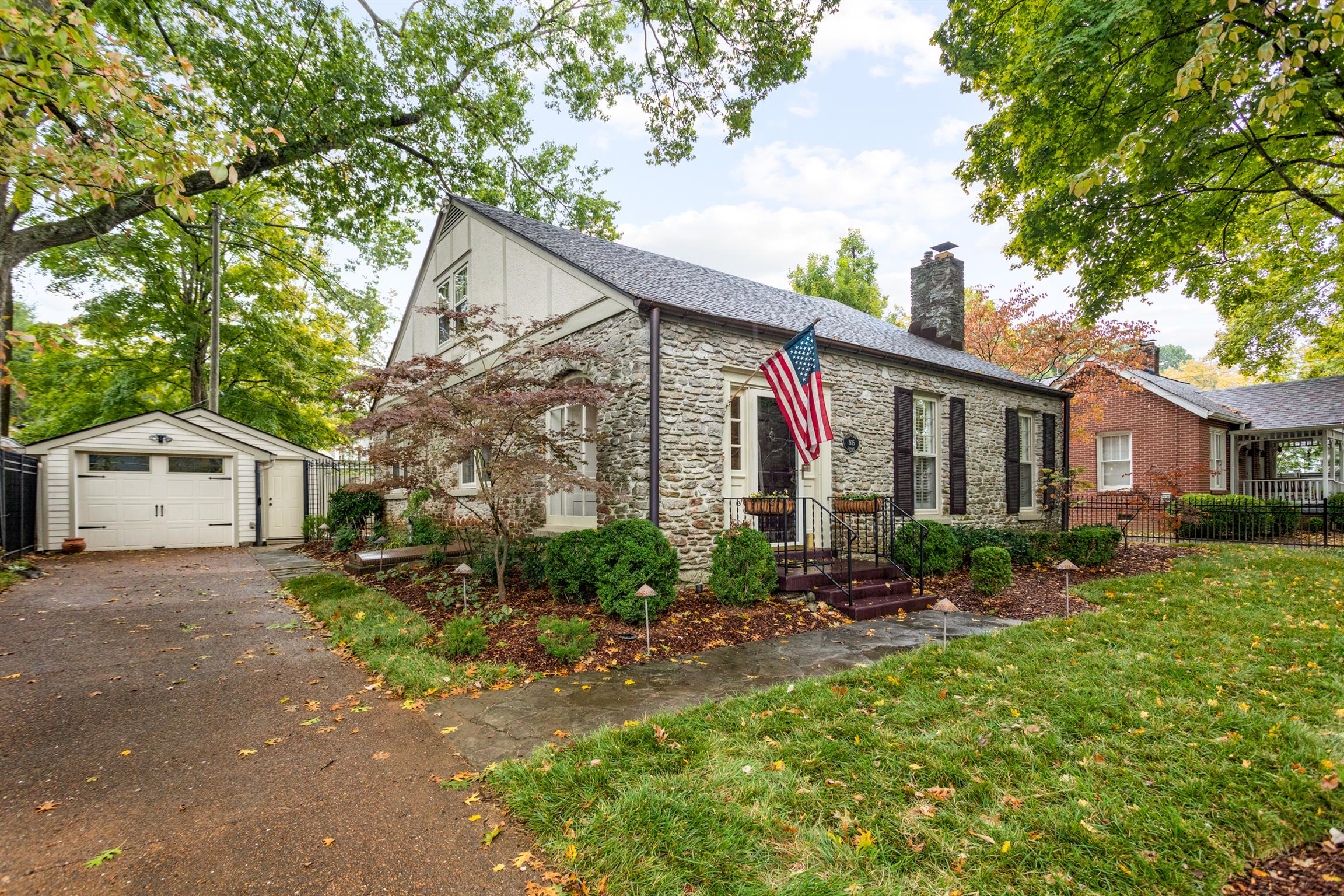 921 Fair Street Franklin, TN 37064 - Photo 2 of 30 a front view of a house with garden