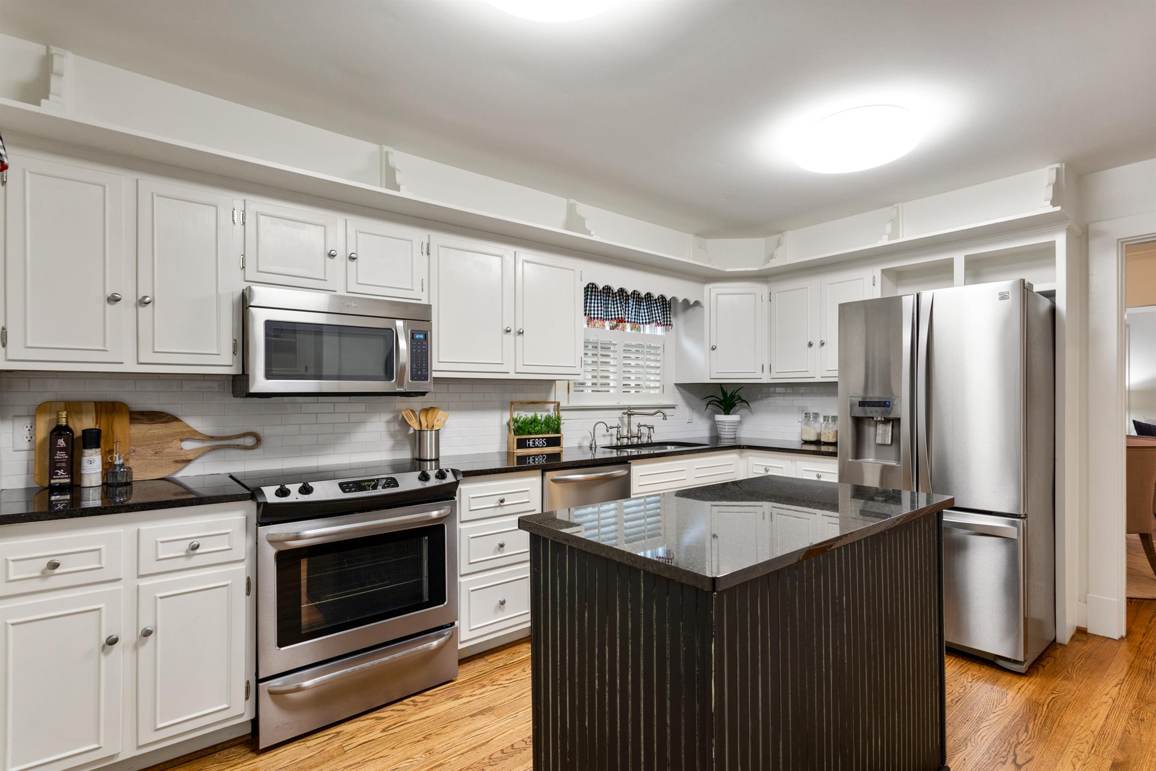 921 Fair Street Franklin, TN 37064 - Photo 12 of 30 a kitchen with a sink stove and refrigerator