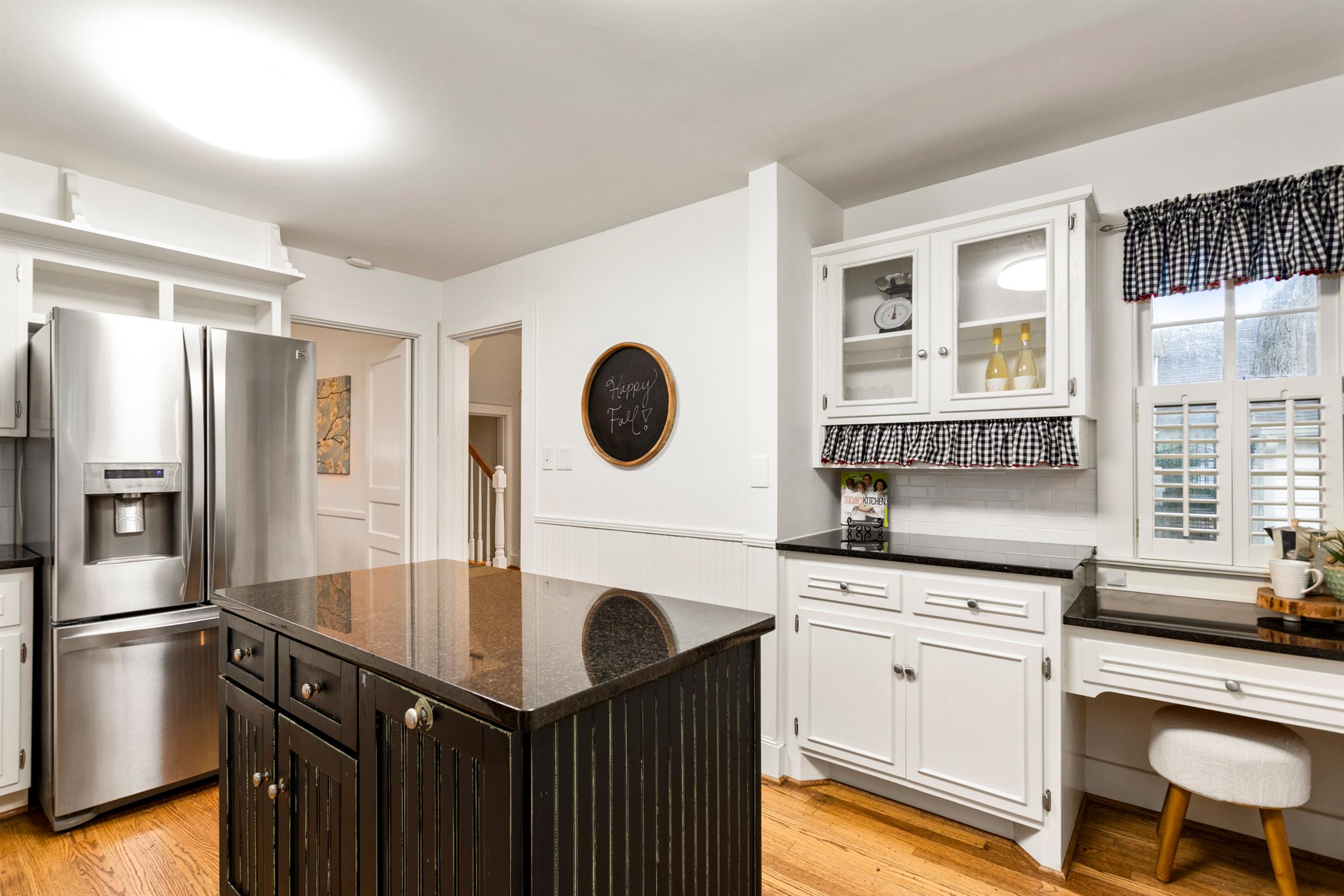 921 Fair Street Franklin, TN 37064 - Photo 13 of 30 a kitchen with stainless steel appliances granite countertop a sink a stove and a refrigerator
